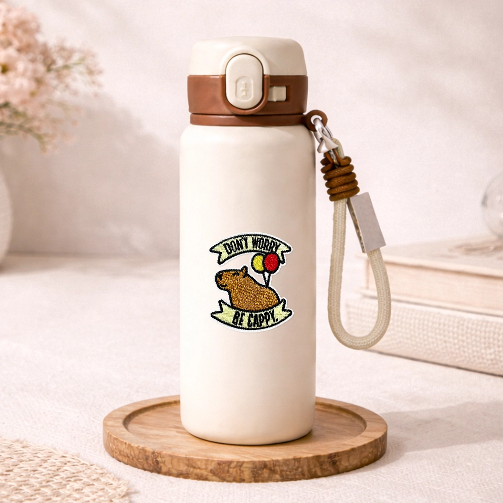 Embroidered patches for insulated tumbler